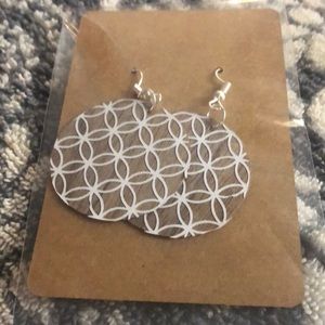 Homemade wooden earrings.  Circle white
